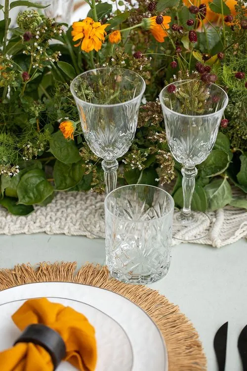 Yellow-orange table setting at rectangular table
